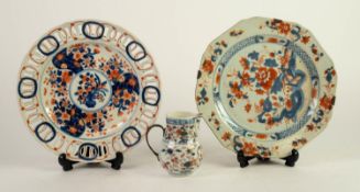 TWO NINETEENTH CENTURY ORIENTAL IMARI PORCELAIN PLATES, both floral painted, one with pierced