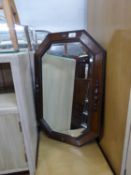 AN OAK FRAMED WALL MIRROR WITH CANTED CORNERS AND A SMALL WASHED CHINESE RUG (2)