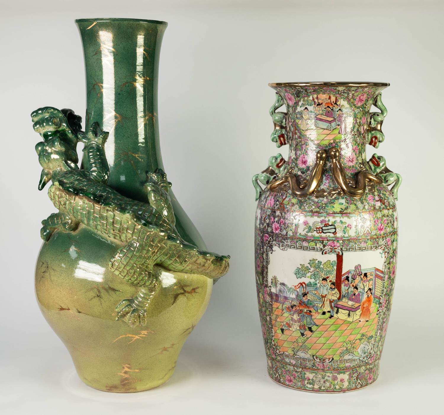 TWO MODERN ORIENTAL POTTERY VASES, one of baluster form, moulded in high relief with a spiralling