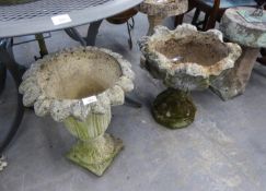 A CAST AGGREGATE GARDEN VASE, URN SHAPED AND A LOW OVAL GARDEN VASE (2)