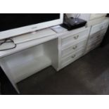 A MODERN WHITE COLOURED DRESSING TABLE, A MATCHING 3 DRAWER CHEST AND A SIMILAR 3 DRAWER BEDSIDE