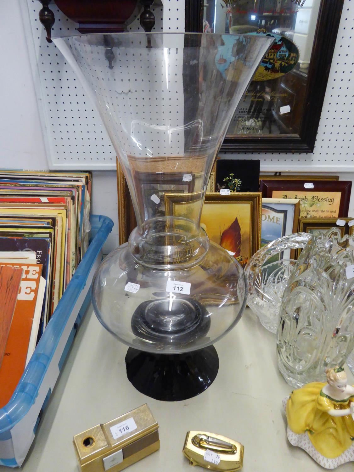 A LARGE FLOOR STANDING OR SHOP DISPLAY GLASS VASE WITH CLEAR THISTLE SHAPE TOP ON INVERTED