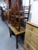 AN OAK DRAW-LEAF DINING TABLE AND FOUR EDWARDIAN BEDROOM CHAIRS (ALL A.F.) (5)