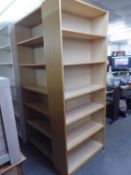 A PAIR OF PINE EFFECT SIX TIER OPEN BOOKCASES, 2?8? WIDE