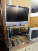 PANASONIC VIERA FLATSCREEN TELEVISION 23? WITH TOSHIBA VIDEO AND DVD PLAYER, ON BRIGHT METAL AND