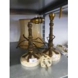 A PAIR OF GILT METAL TABLE LAMPS WITH CREAM MARBLE CIRCULAR BASES AND ONE FABRIC SHADE (3)