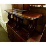 A NEST OF THREE DARK MAHOGANY COFFEE TABLES, ON TRESTLE END SUPPORTS