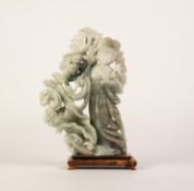 ORIENTAL CARVED GREY/GREEN JADE FEMALE FIGURE standing by a shrub and holding spray in her left