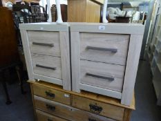 A PAIR OF MODERN LIMED OAK TWO DRAWER BEDSIDE CHESTS