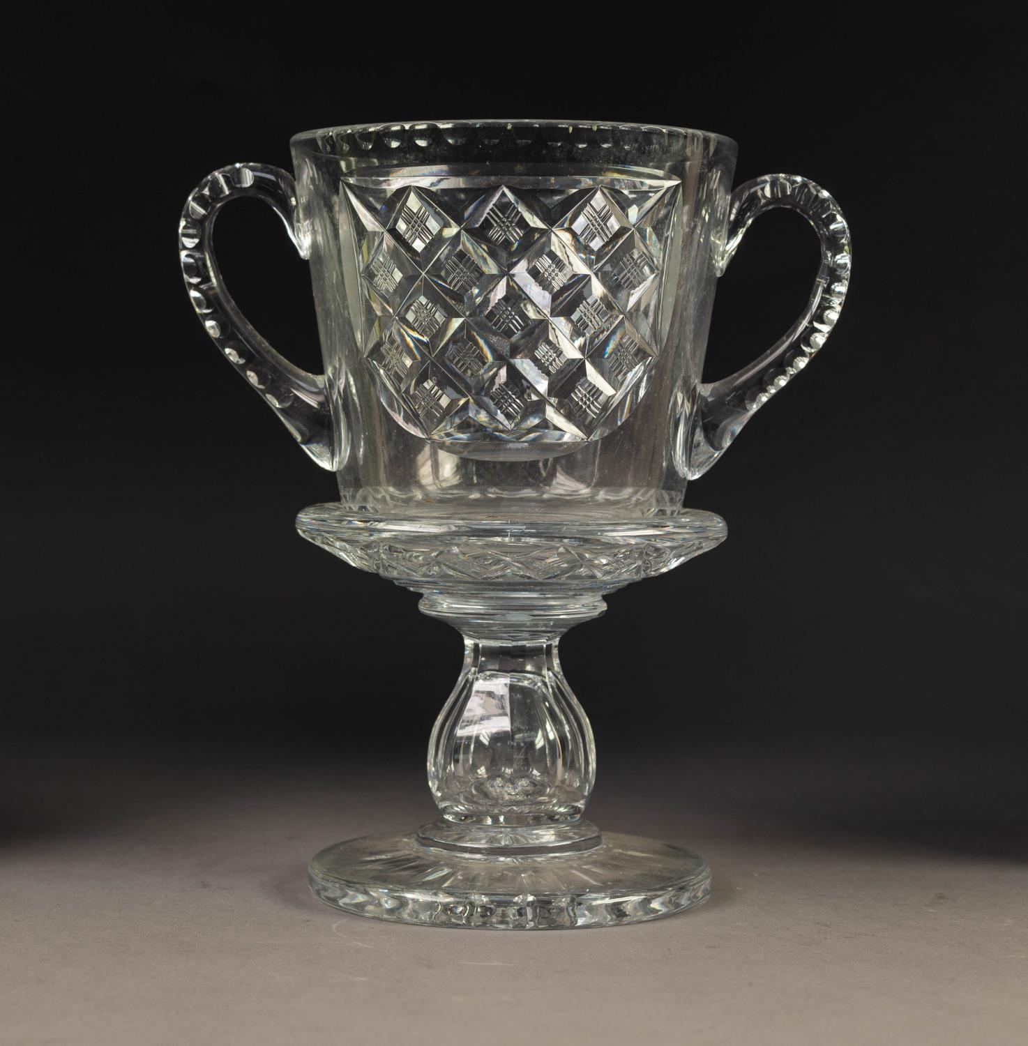 HEAVY QUALITY CUT GLASS TWO HANDLED GOBLET PATTERN VASE, 8 ½? (21.6cm) high, unmarked C/R-