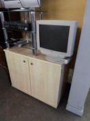 A LIGHT WOOD TWO DOOR COMPUTER CABINET WITH MESH COMPUTER TOWER; TAXAN MONITOR; KEYBOARD; MOUSE