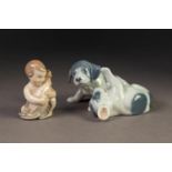 TWO ROYAL COPENHAGEN CHINA GROUPS, one modelled as two puppies playing, (453), 4? (10.2cm) long, and