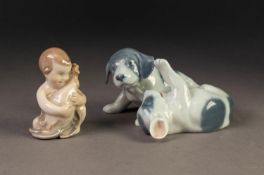 TWO ROYAL COPENHAGEN CHINA GROUPS, one modelled as two puppies playing, (453), 4? (10.2cm) long, and