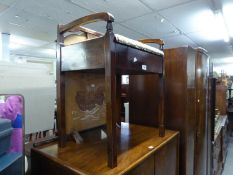 A MAHOGANY PIANO STOOL WITH BOX SEAT AND A 1930's GALLEON DECORATED GRATE SCREEN (2)