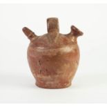 AGED COLUMBIAN BURNISHED EARTHENWARE VESSEL, with central loop handle and shaped spout, 6 3/4in (