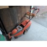 FLYMO ELECTRIC ROTARY LAWN MOWER; AN ELECTRIC HEDGE TRIMMER