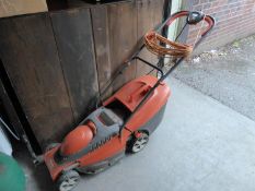 FLYMO ELECTRIC ROTARY LAWN MOWER; AN ELECTRIC HEDGE TRIMMER