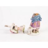 EIGHTEENTH CENTURY ENGLISH PORCELAIN FIGURE, painted in colours and modelled as a maid with a lamb