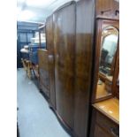 A 1930's WALNUTWOOD BEDROOM SUITE OF THREE PIECES, COMPRISING; A WARDROBE WITH SINGLE BOWED FRONT