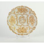 MEISSEN MOULDED PORCELAIN SHALLOW DISH, decorated with floral panels, heightened on gilt, 2 ¼? (5.