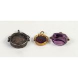 ROLLED GOLD WIRE PATTERN FOB with three-sided and faceted revolving amethyst; VICTORIAN SILVER