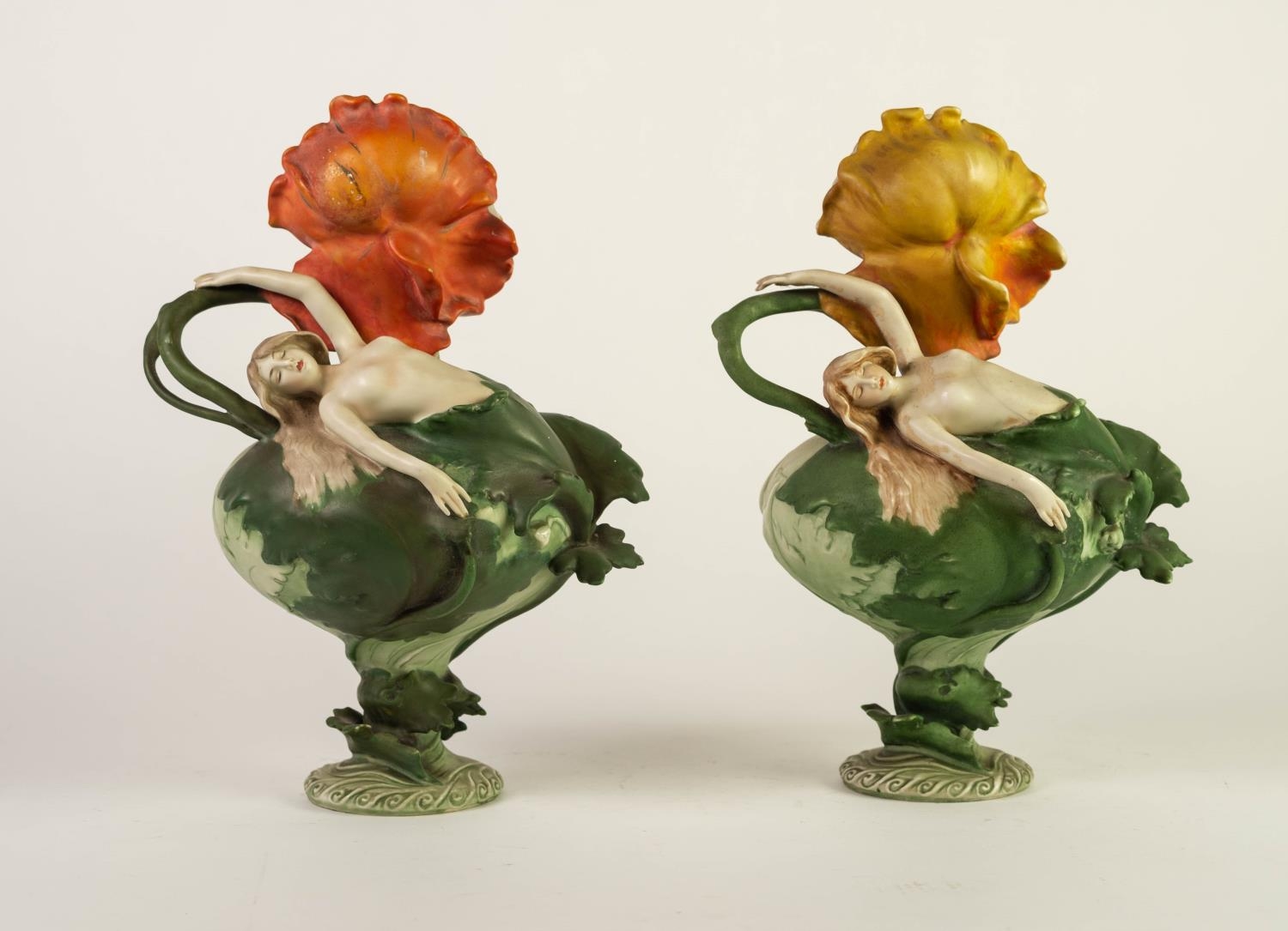 MATCHING PAIR OF ROYAL DUX STYLE FIGURAL PEDESTAL ORNAMENTS, each painted in muted tones and