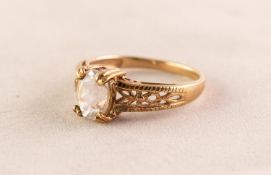 9ct GOLD DRESS RING with an oval white stone in a four claw setting, 2.7gms, ring size N