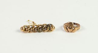 TWO GOLD COLOURED METAL ITEMS, viz a Claddagh ring (marks worn) and a curb link pattern bar