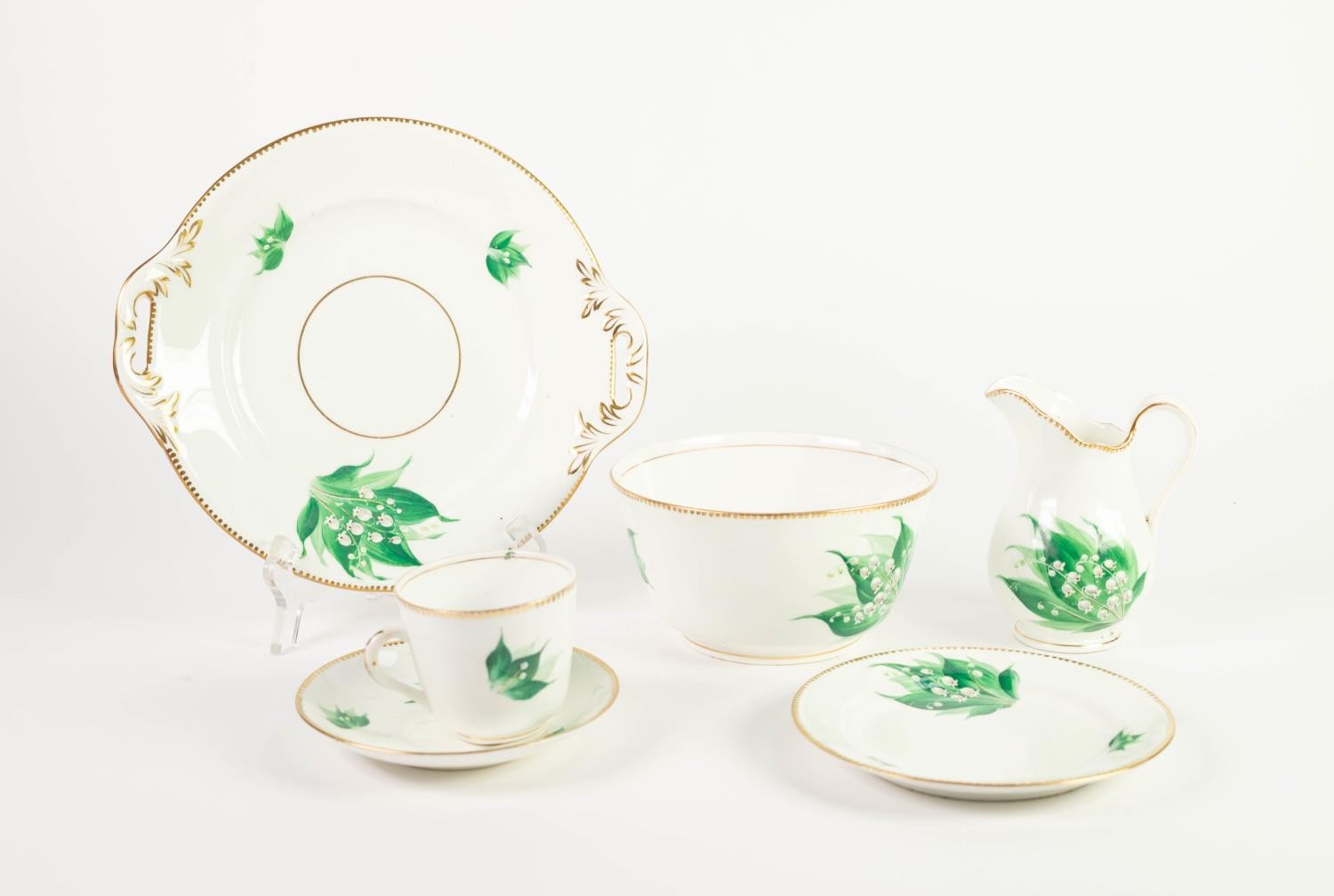 VICTORIAN CHINA TEA SET FOR TWELVE PERSONS with bucket shaped cups, a pair of cake plates (c/r one