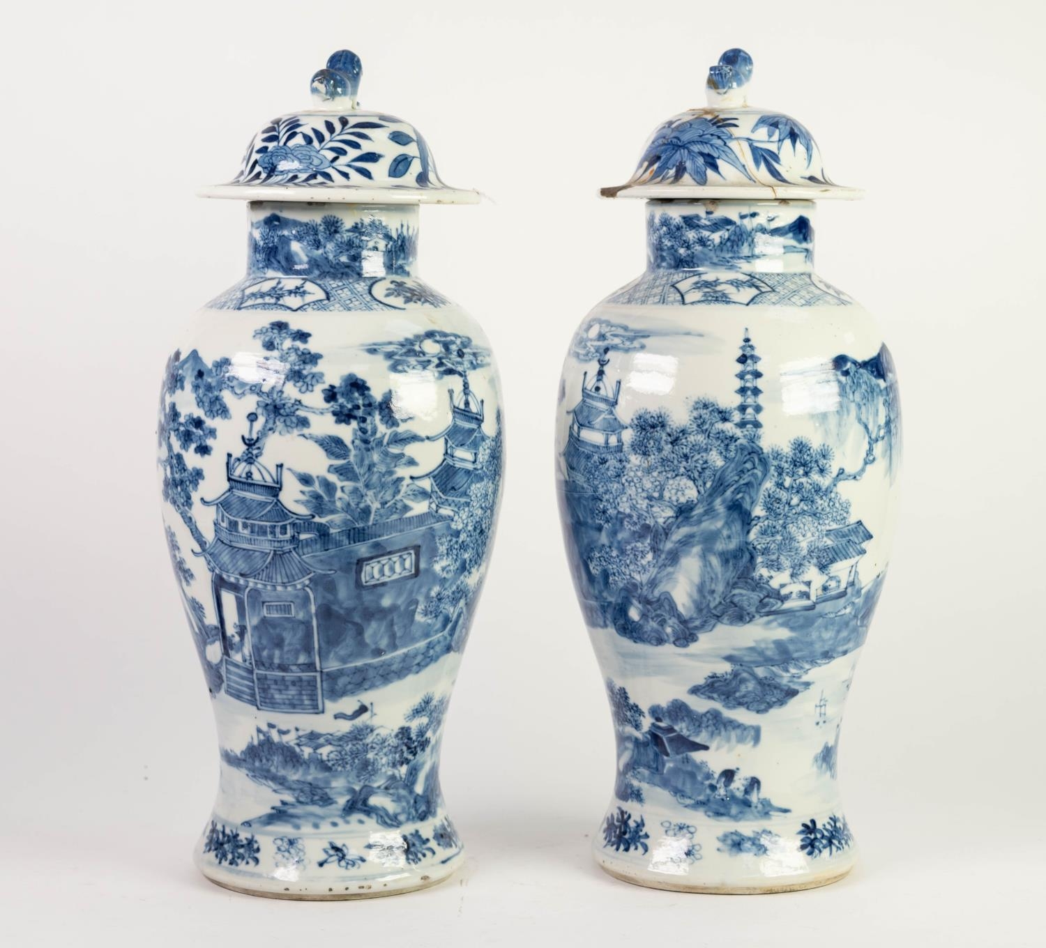 PAIR OF NINETEENTH CENTURY CHINESE BLUE AND WHITE PORCELAIN VASES WITH LATER COVERS, each well