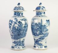 PAIR OF NINETEENTH CENTURY CHINESE BLUE AND WHITE PORCELAIN VASES WITH LATER COVERS, each well