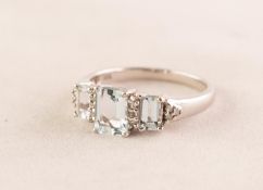 9ct WHITE GOLD RING, set with three oblong aquamarines and twelve tiny diamonds, 2.7gms, ring size O