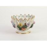 MODERN DRESDEN FLORAL ENCRUSTED AND PIERCED PORCELAIN FOOTED BOWL, of steep sided form with deep