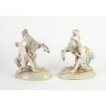 PAIR OF GERMAN PORCELAIN ?MARLEY HORSE? GROUPS, each typically modelled with semi naked male