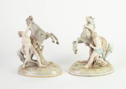 PAIR OF GERMAN PORCELAIN ?MARLEY HORSE? GROUPS, each typically modelled with semi naked male