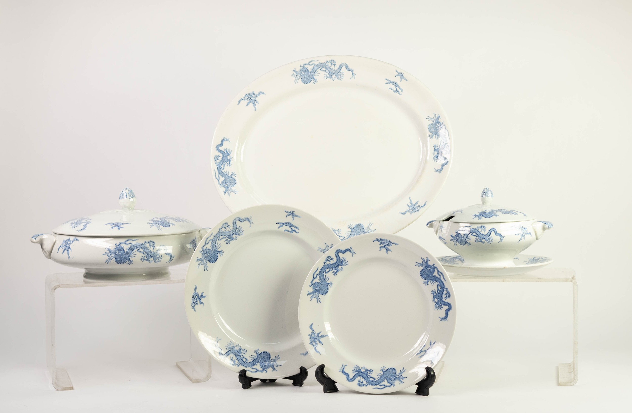 P.P & Co. BURSLEM CHINESE BLUE 'DRAGON' PATTERN POTTERY DINNER SERVICE, formerly for twelve persons,