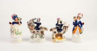 PAIR OF VICTORIAN STAFFORDSHIRE POTTERY MANTEL SHELF SPILL HOLDERS, each of a figure with a bird