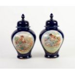 PAIR OF SEVRES STYLE PORCELAIN VASES AND COVERS, each of inverted baluster form with pointed