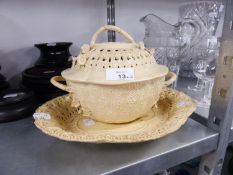 NINETEENTH CENTURY CREAMWARE POTTERY TWO HANDLED CHESTNUT BASKET AND COVER, of two handled oval,