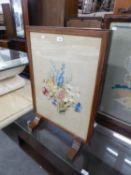 FLORAL EMBROIDERED SILK PANEL FIRE SCREEN, IN AN OAK FRAME