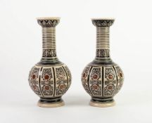 PAIR OF SIMON PETER GERZ, GERMAN MOULDED STONEWARE VASES, each of globe and shaft form with cupped