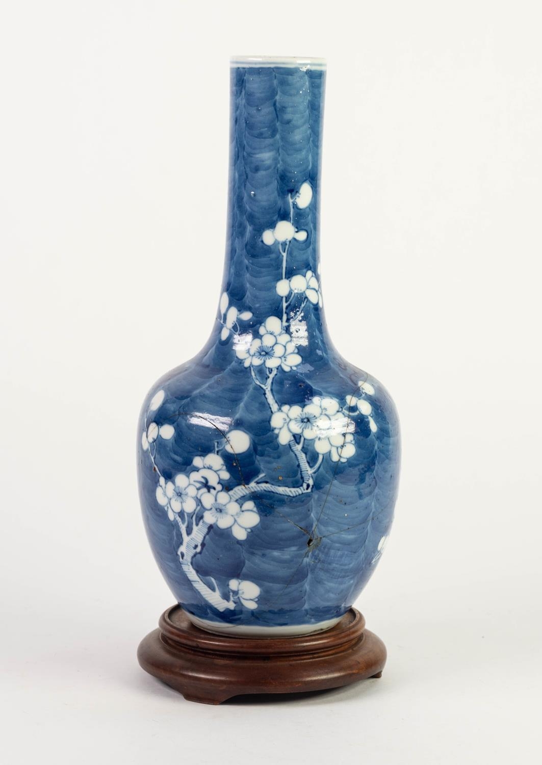 CHINESE BLUE AND WHITE PORCELAIN BOTTLE VASE, painted with prunus on a cracked ice ground, 12? (30. - Image 2 of 4