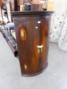 GEORGE III MAHOGANY BOW FRONTED HANGING CORNER CUPBOARD