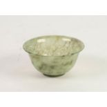 ORIENTAL TRANSLUCENT GREEN HARDSTONE SMALL BOWL, of steep sided, footed form with flared rim, 2? (