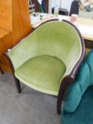 PARKER KNOLL MAHOGANY FRAMED TUB SHAPED ARMCHAIR, IN GREEN