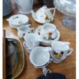 ENGLISH CHINA DOLL?S TEA SET, FOR SIX DOLLS, PRINTED WITH CARTOON ANIMALS AND TEXT (PRINTED SHELL