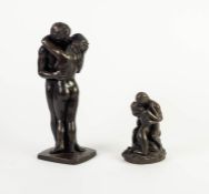 TWO HEREDIITES BRONZED RESIN GROUPS OF NAKED FIGURES EMBRACING One modelled standing, signed ROWLAND