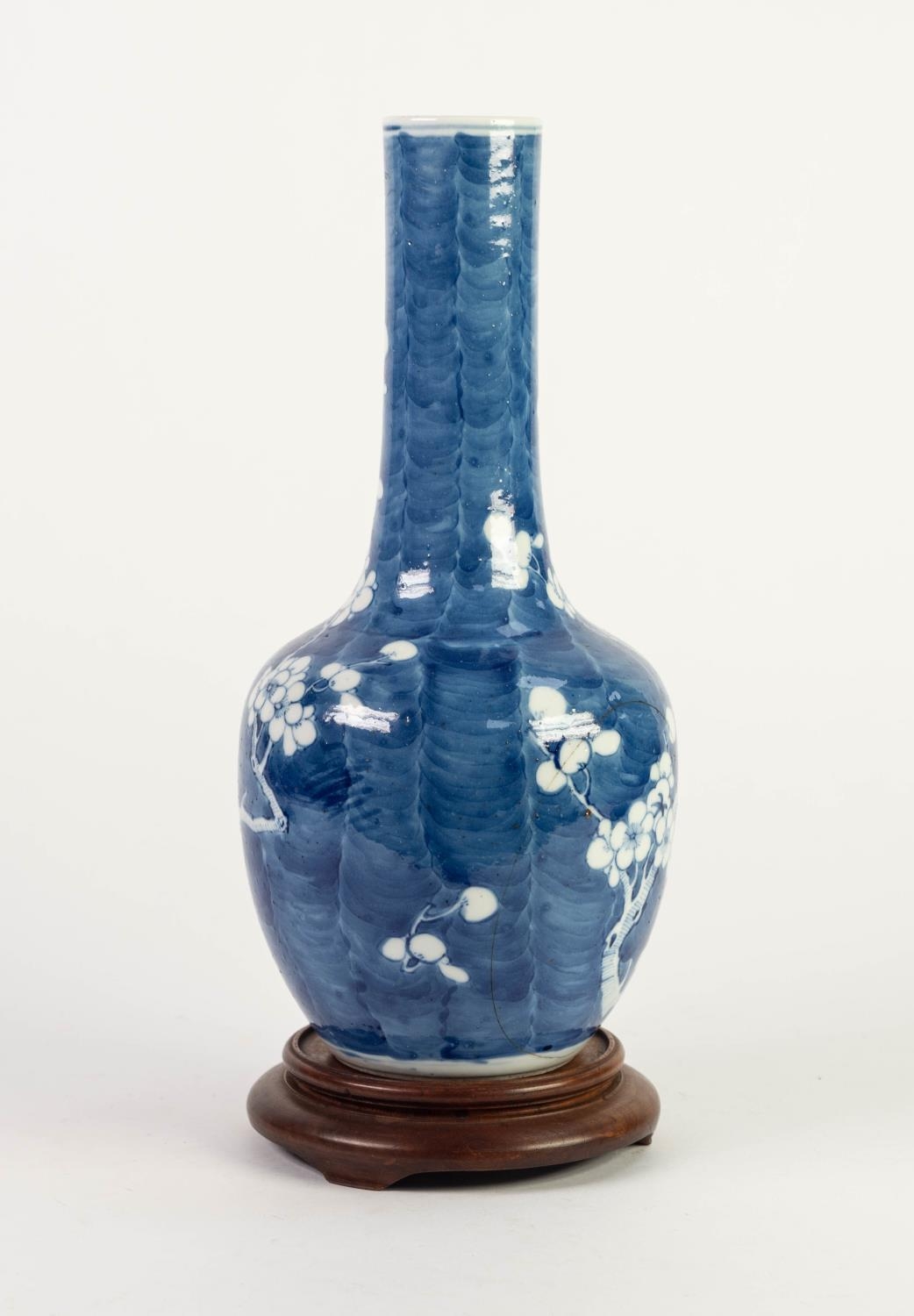 CHINESE BLUE AND WHITE PORCELAIN BOTTLE VASE, painted with prunus on a cracked ice ground, 12? (30. - Image 3 of 4