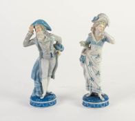 PAIR OF LATE NINETEENTH CENTURY SITZENDORF PORCELAIN FIGURES, heightened in blue and modelled as