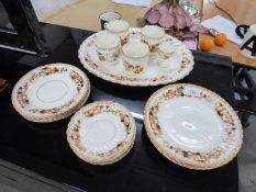 A LATE VICTORIAN CHINA PART TEA SERVICE OF 18 PIECES, SUFFICIENT FOR FOUR PERSONS, WITH BROWN
